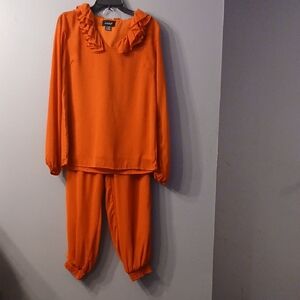 Ashro Orange Ruffled Two-Piece Pant Set.